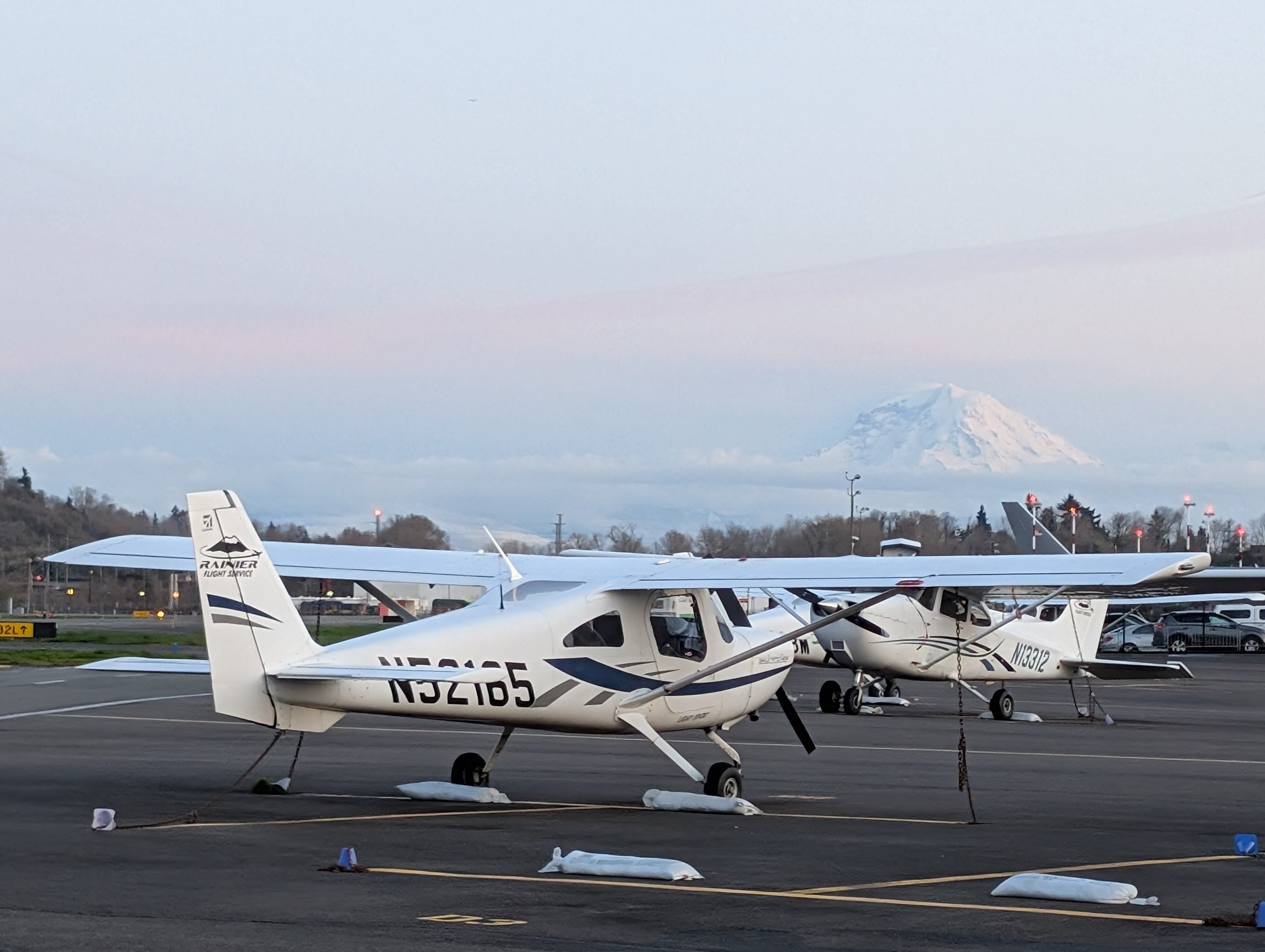 Cessna N53185 on the ramp at dawn with Mount Rainier behind
